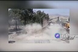 خاموش کردن پیکان آتش گرفته با لودر