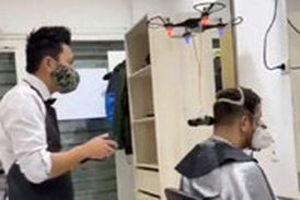 عجیب‌ترین آرایشگاه دنیا بعد از شیوع کرونا:پهپادی که مو کوتاه می کند!